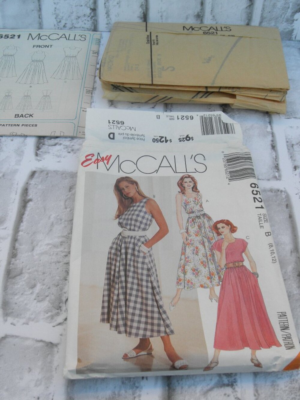 #6521 LIKE NEW MCCALL'S UNCUT SEWING PATTERN MISSES DRESS (SIZE 8-10-12) 15 PCS